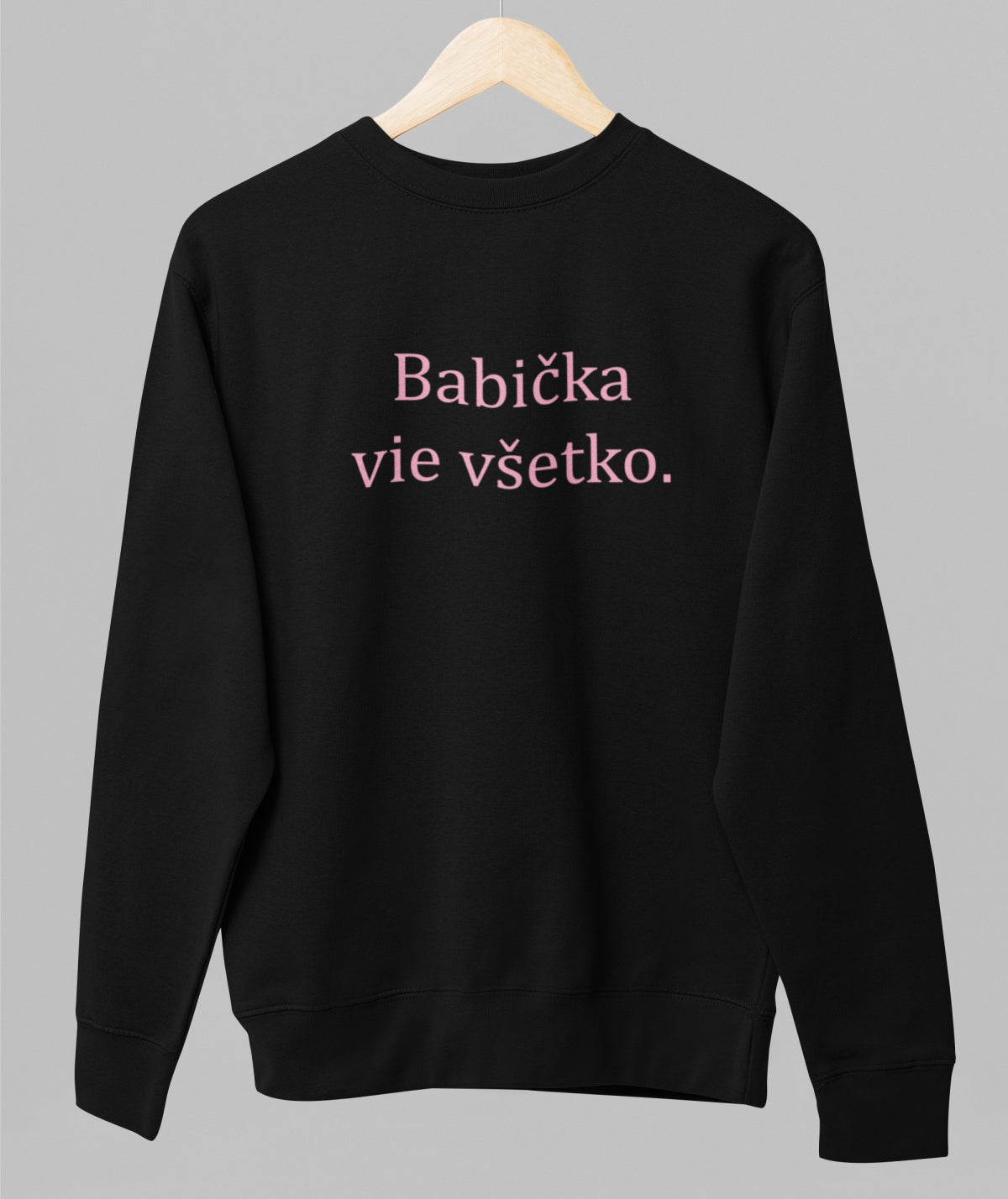 Black unisex sweatshirt "Babička vie všetko"