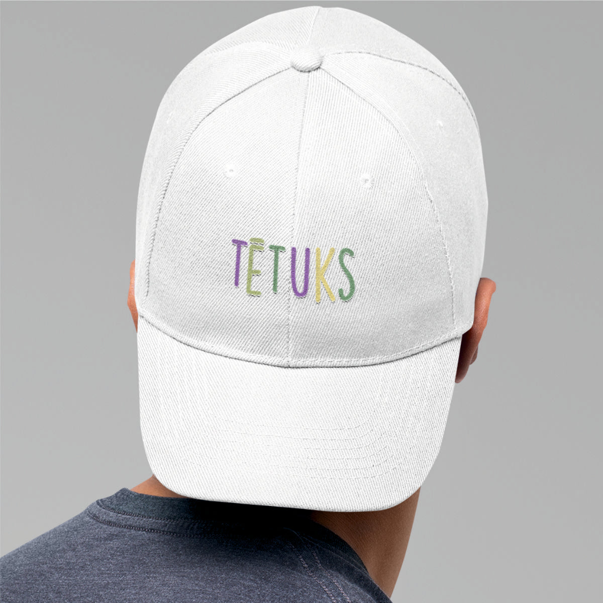 Balta cepure ar nagu "Tētuks"